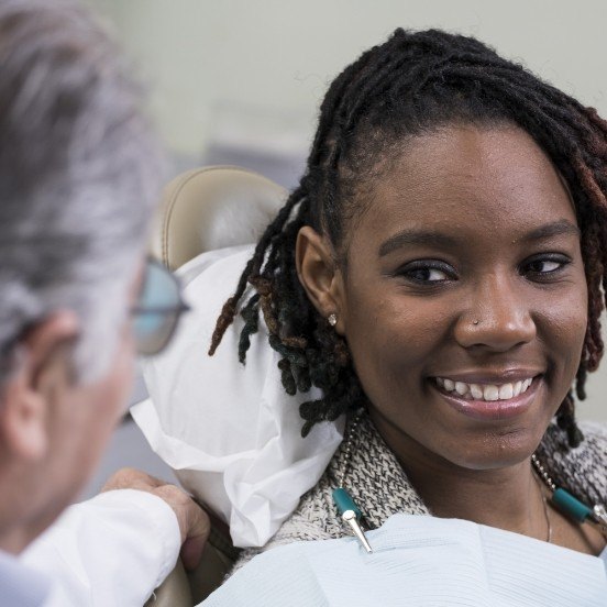 Woman smiling at dentist