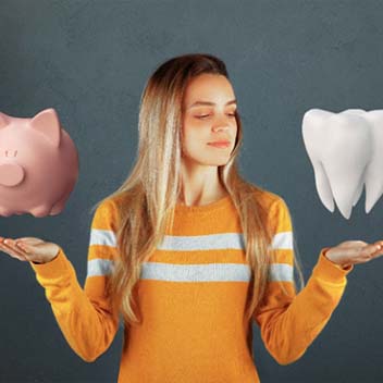 woman with tooth and piggy bank cosmetic dentistry Portland