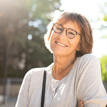 Woman with dental implants smiling in Portland