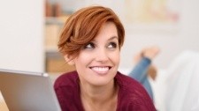 Woman with healthy smile after gum disease treatment