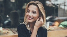 Woman with gorgeous smile after cosmetic dentistry